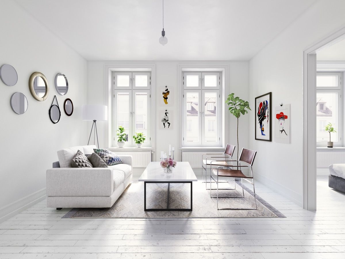 Mẫu phòng khách  minimalist đẹp và ấn tượng đều không thiếu yếu tố ánh sáng